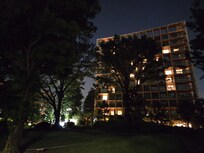 The hotel at night taken from the garden path