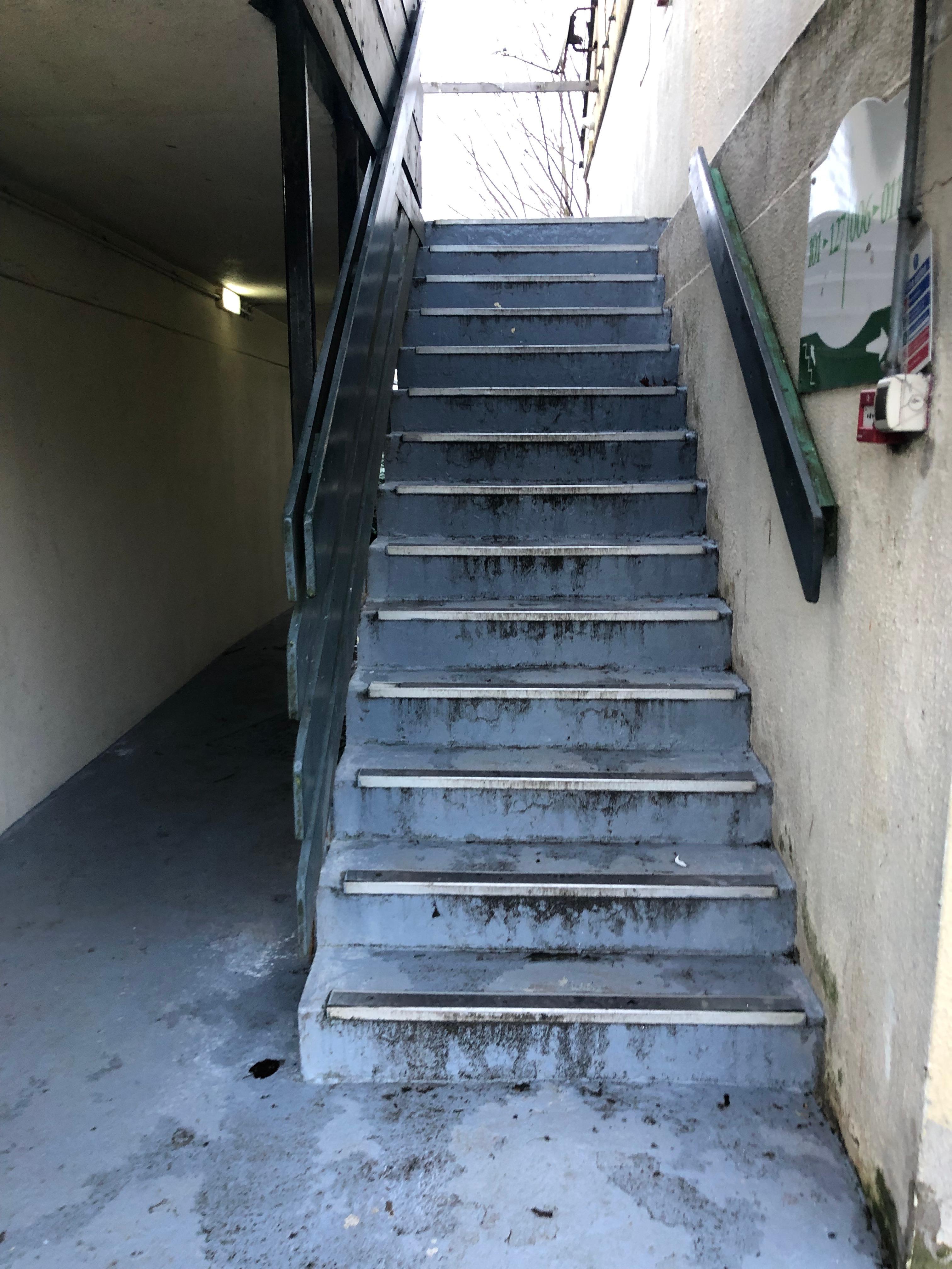 Stairs next to our room leading to bedrooms above drug addicts doing Coke on steps