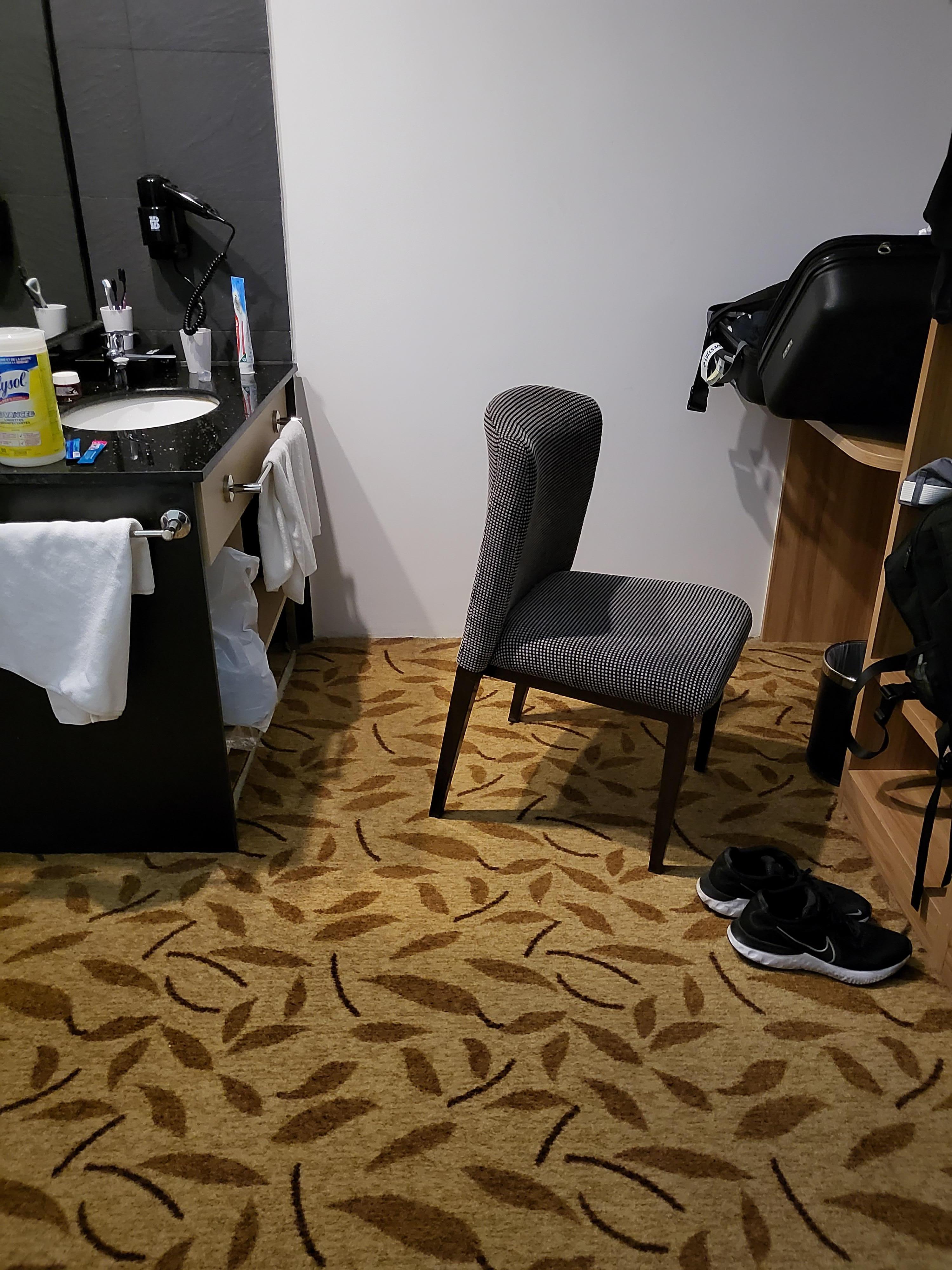 Look at this chair.  You literally cannot sit comfortably on this chair. When I finally got another room the next day, they had another chair that was exactly the same.