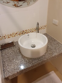 Toilet sink, rusted.