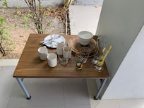 First day it was only one plate ( food has prob been taken by animals) then people kept adding  stuff! Nobody bothered to clean! That was the area where you went to the rooms!