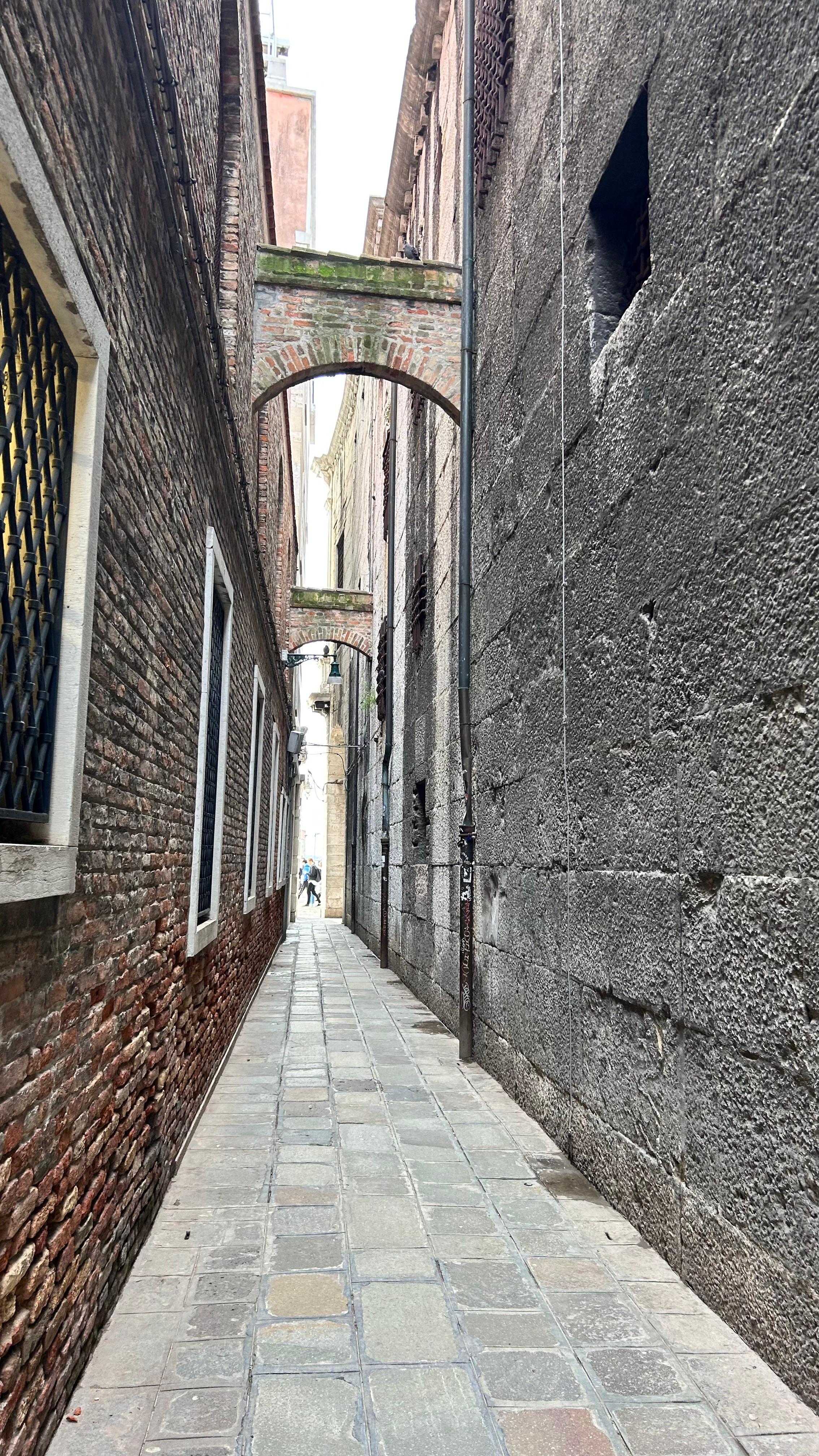 A narrow street off of San Marco plaza leads to the hotel. The hotel’s courtyard and lobby is down another alley to the  left. 