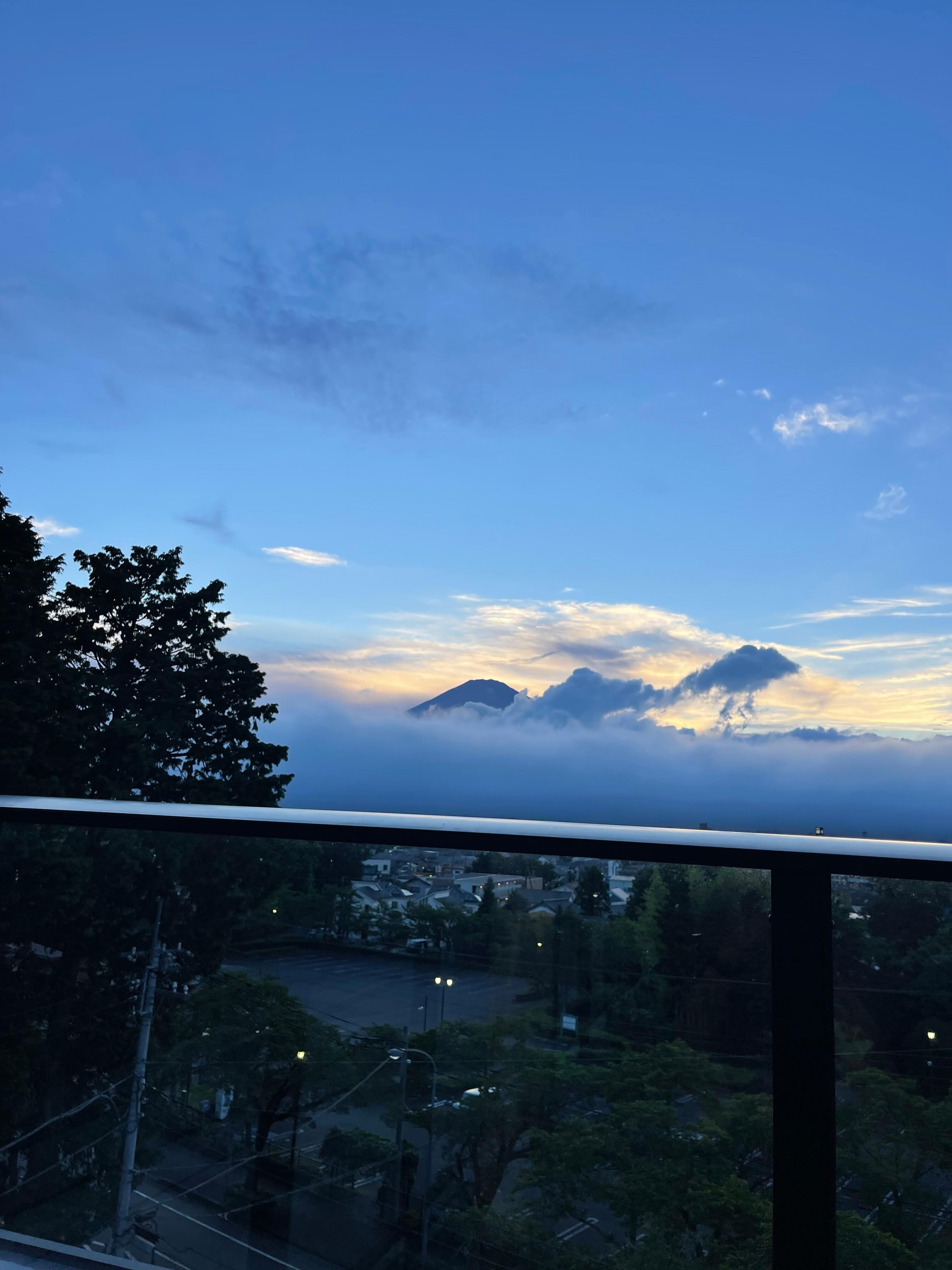 Rooftop foot spa with a view of Mount Fuji.  When the clouds cooperate. 