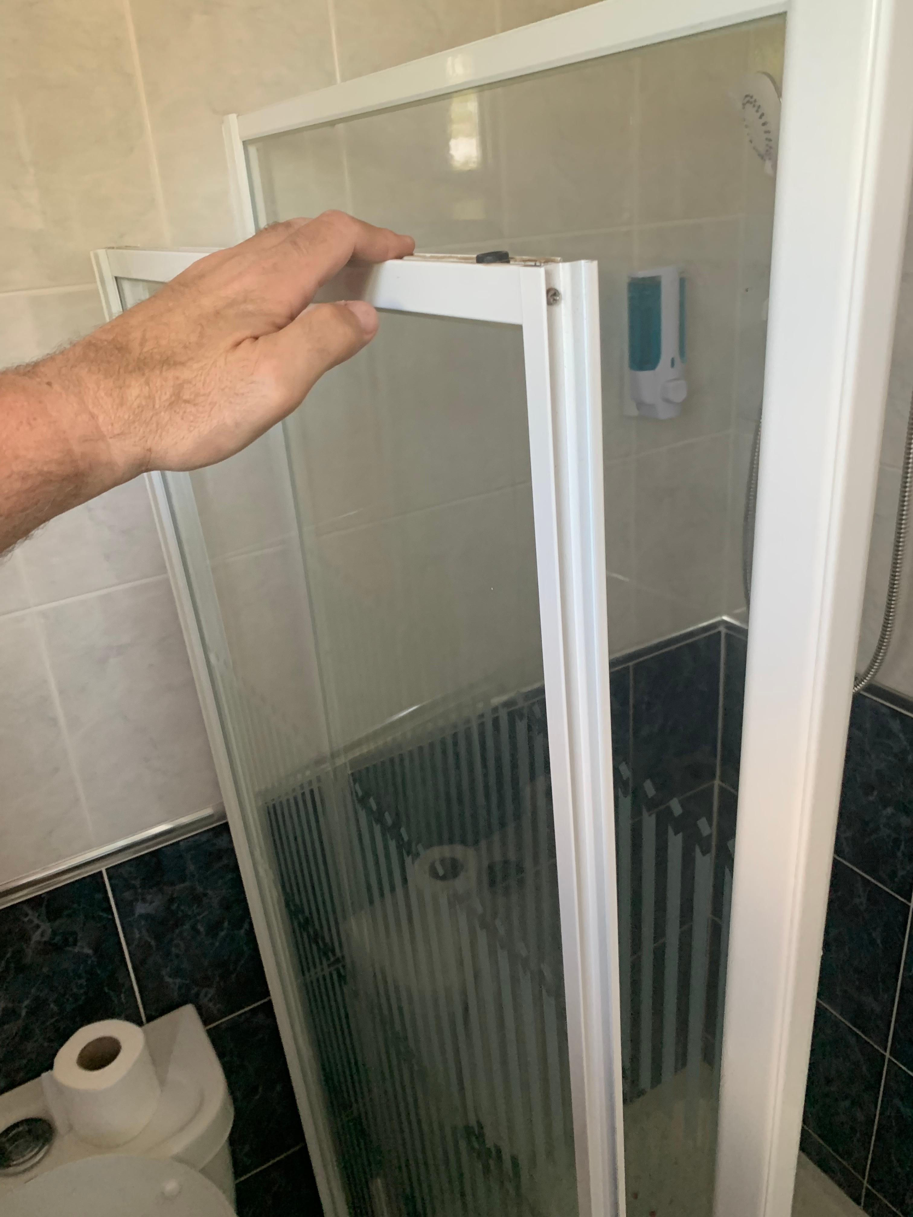 Shower door off it’s mountings