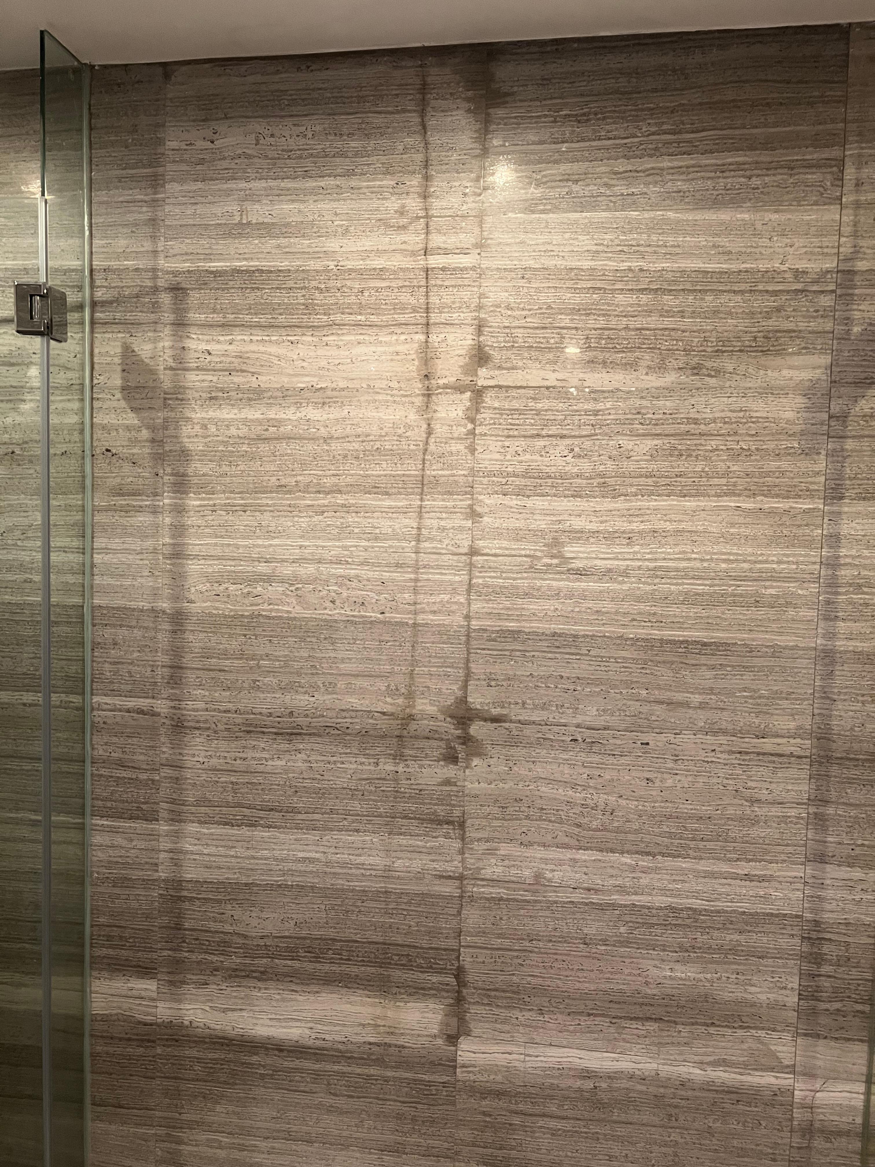 Water leaking down the wall.
