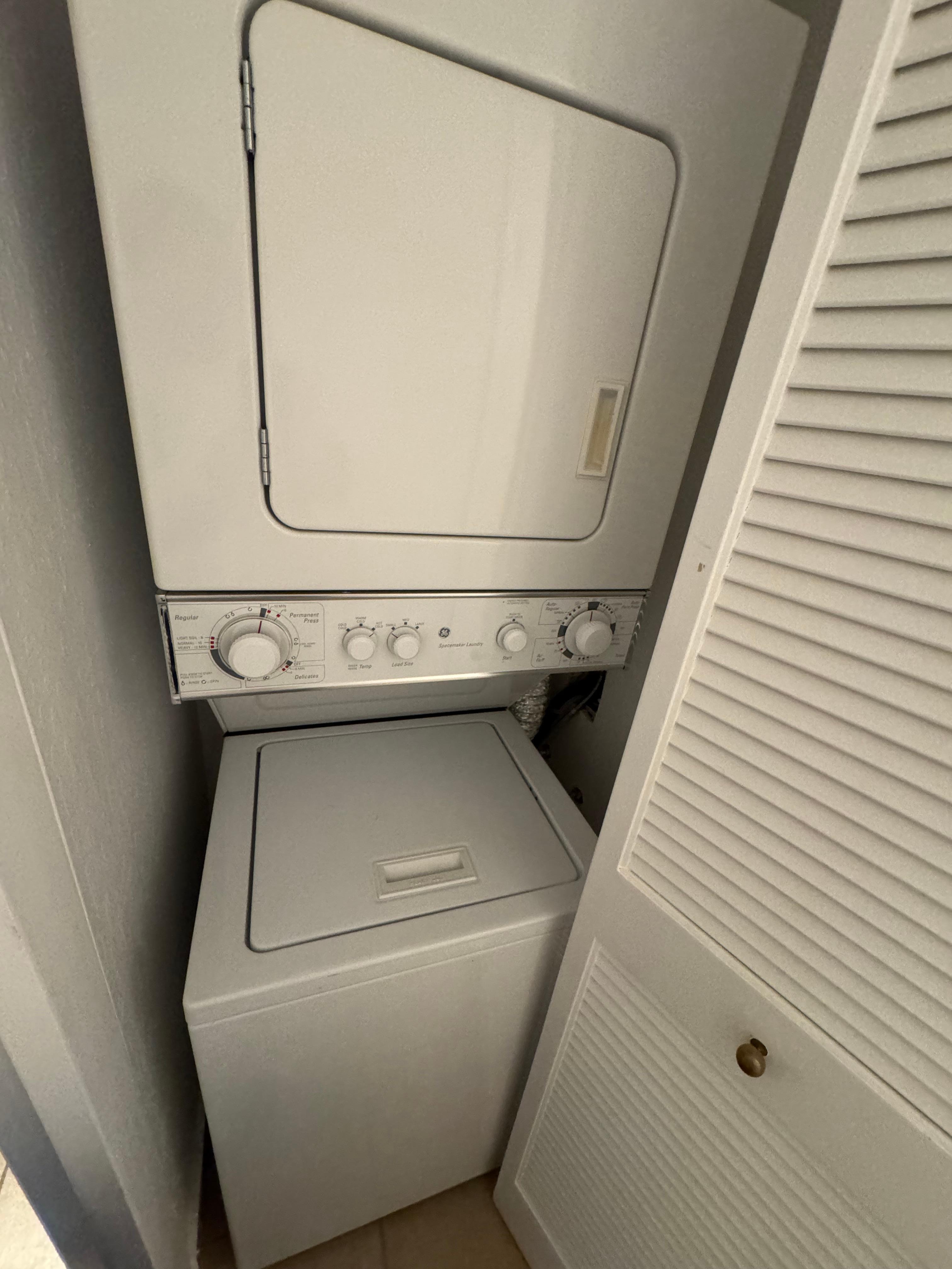 Laundry in suite. Small but works well. 