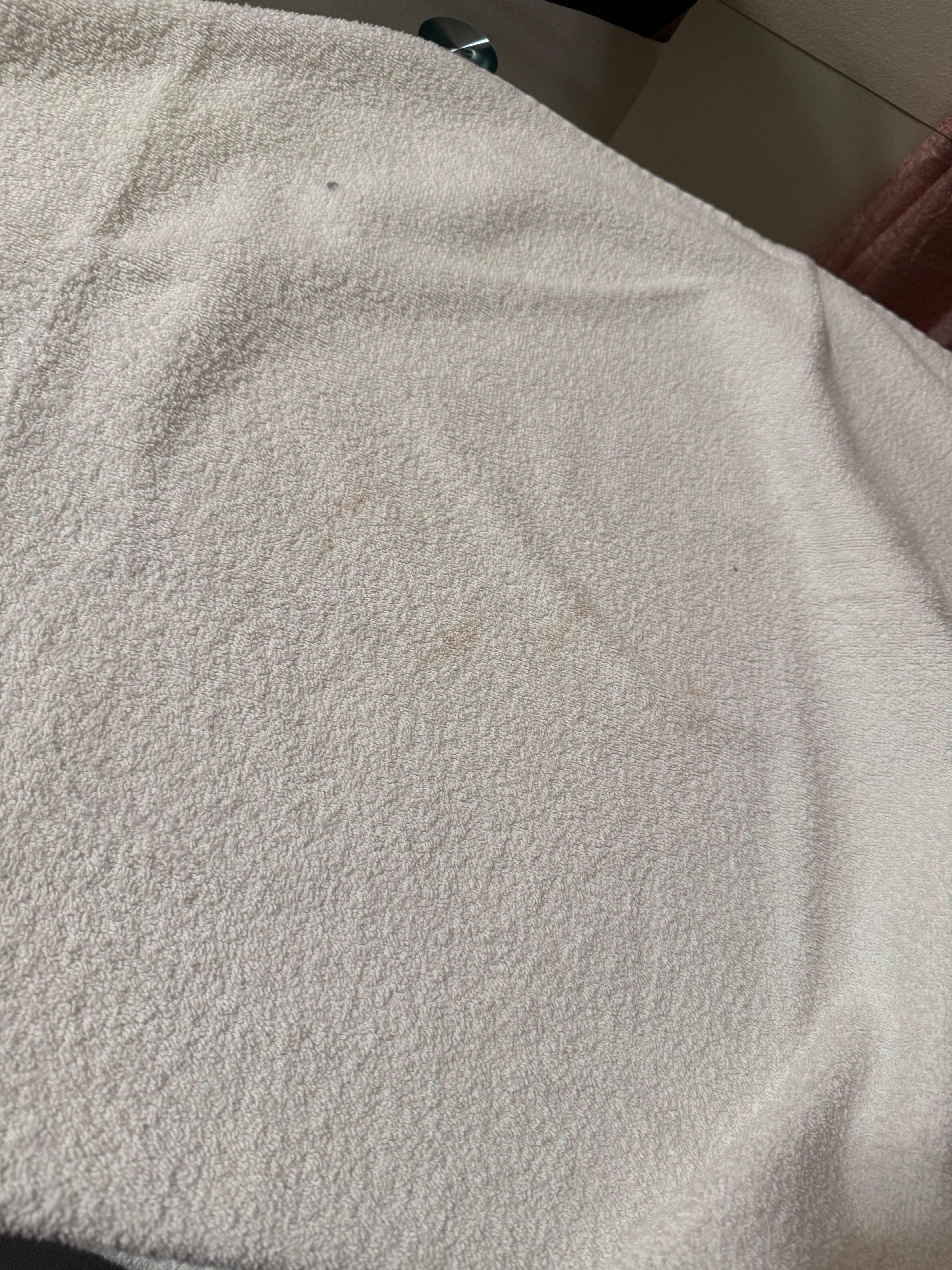 Red stain on towel