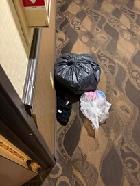 Garbage outside room.
