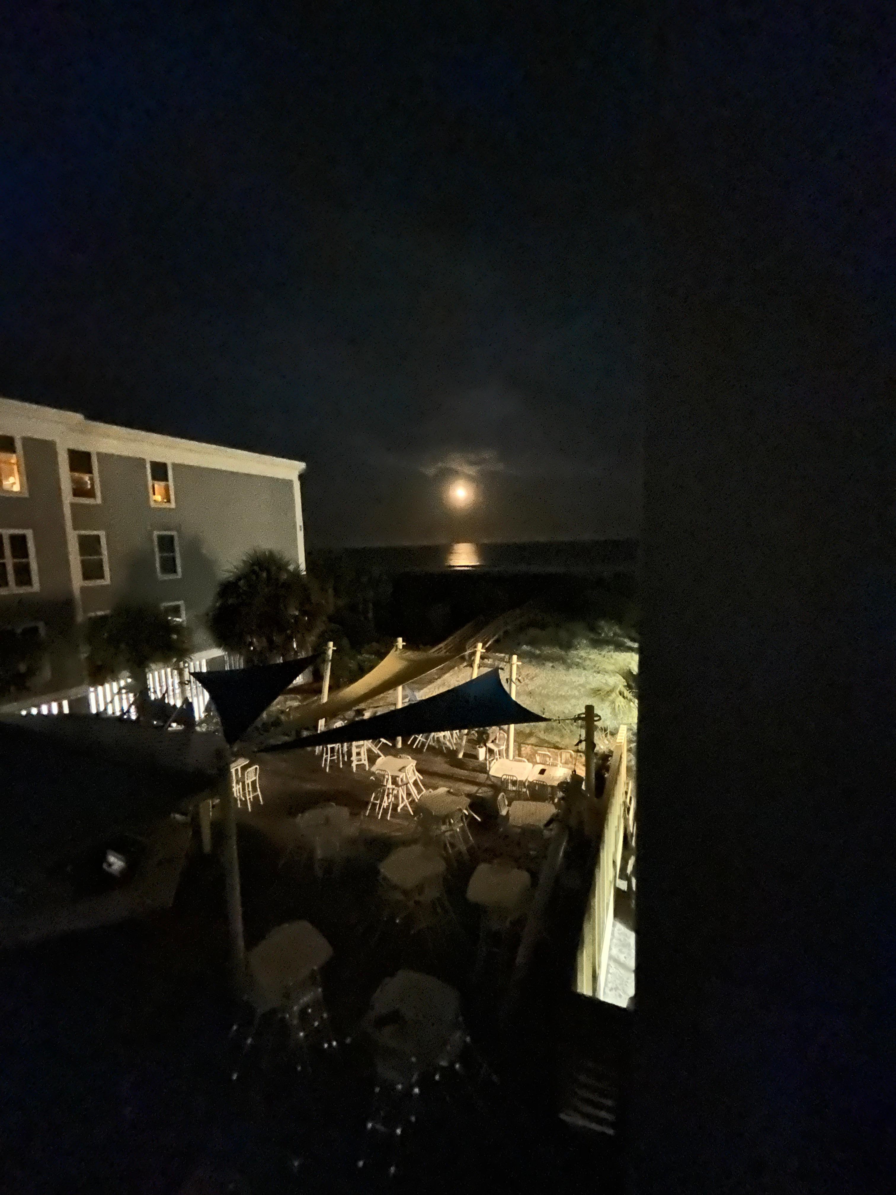 Beautiful “moon over the ocean” picture.