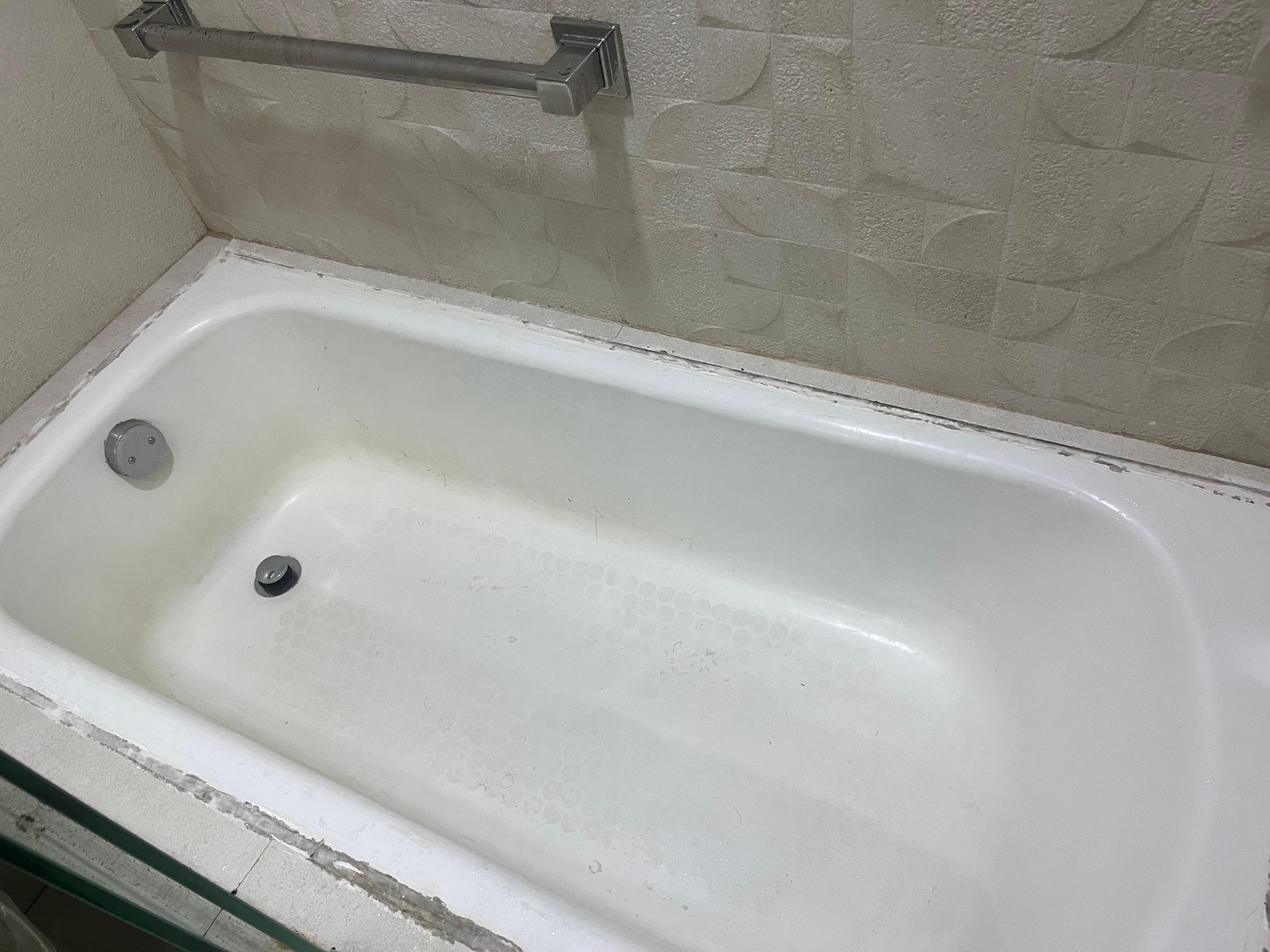 This was the tub and shower after it was supposedly cleaned. 