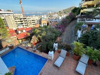 View of pool from bedroom balcony
