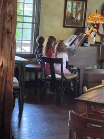The kiddo’s came for the bride of the wedding, but were easily enthralled by the piano.