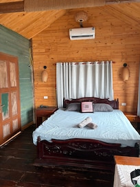 Exposed wires, partially painted doors, generally shabby