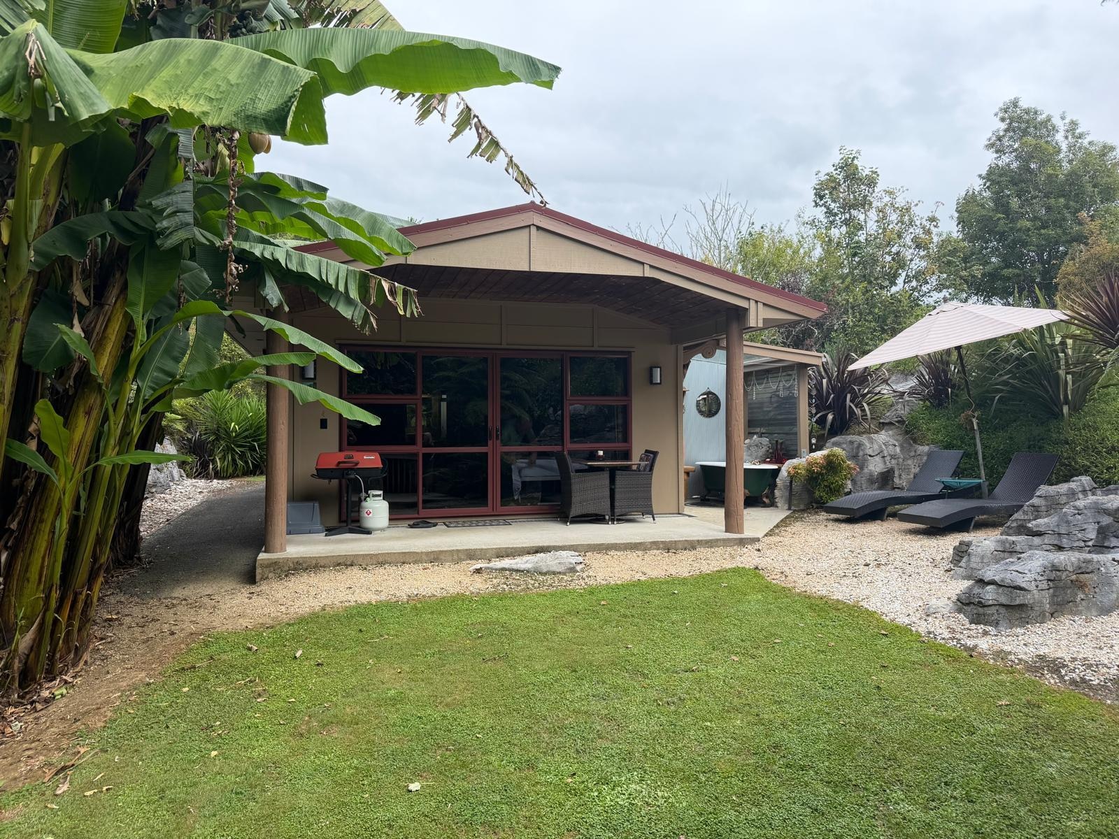 The view of the unit from private backyard.