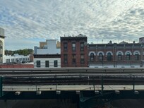 View out the window. Train passes every few minutes but you barely hear it.