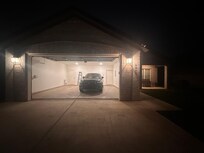 Extremely large and empty garage to store vehicle safety