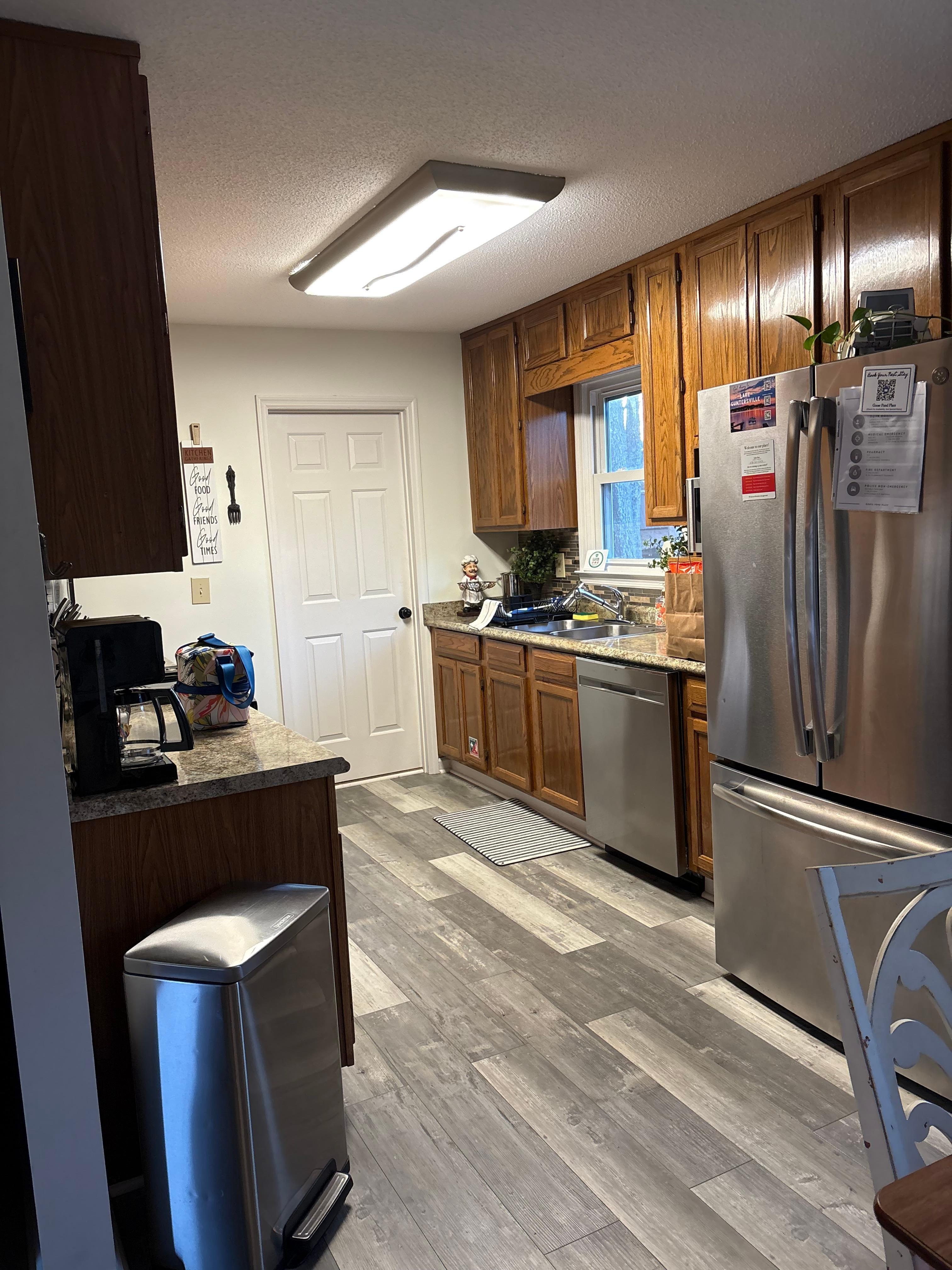 The kitchen was well stocked with dishes, cookware, even condiments and a working icemaker. 