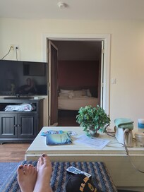 Living rm with view of bedroom.