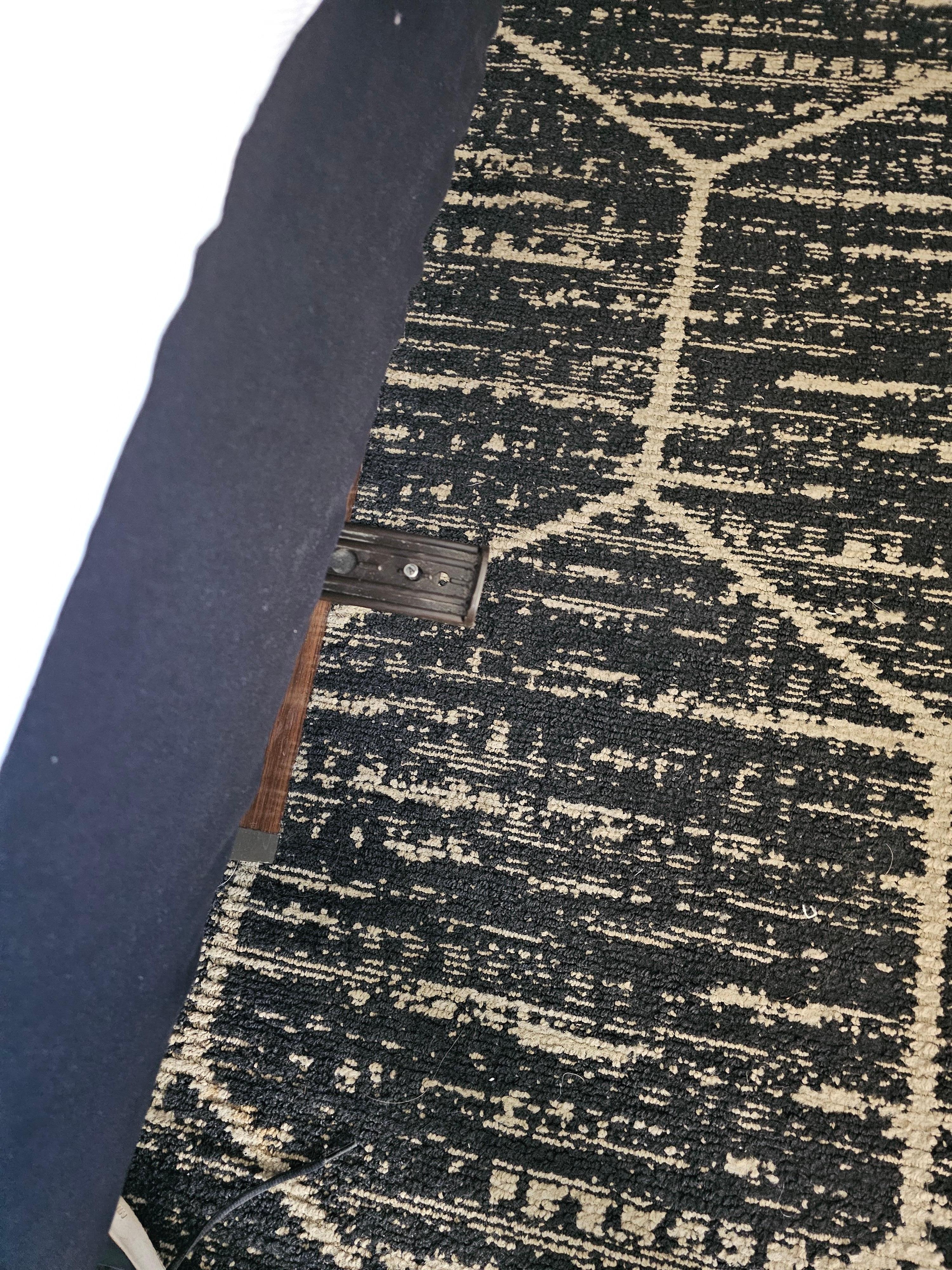 Medal frame sticking out of bedframe, painful if ran into it.  Stuck clothes on it to cushion it.  Mattress was unsteady,  couldn't move it.
