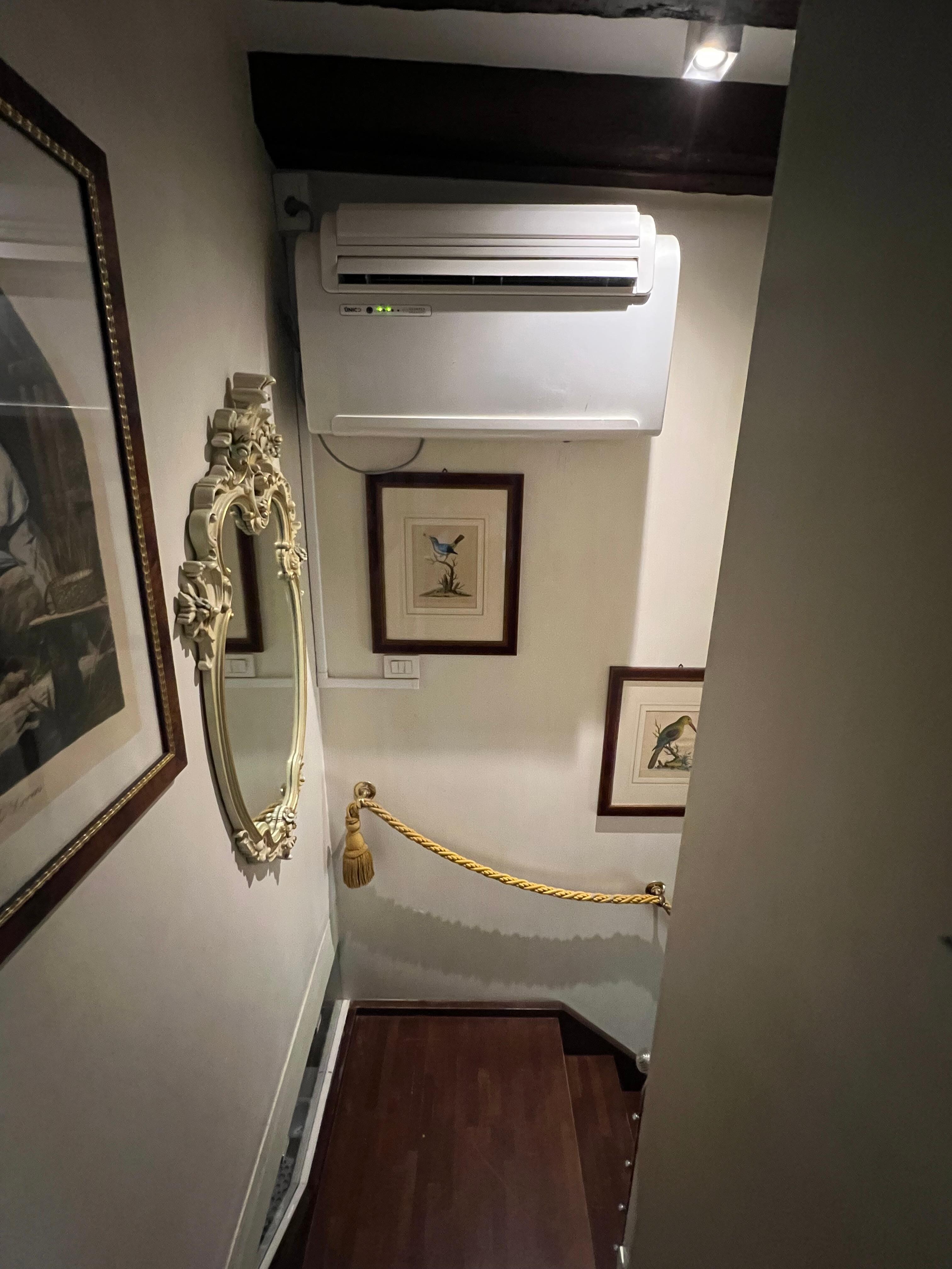 One air conditioner unit. Air had to take a 90 degree turn to reach primary bedroom. 