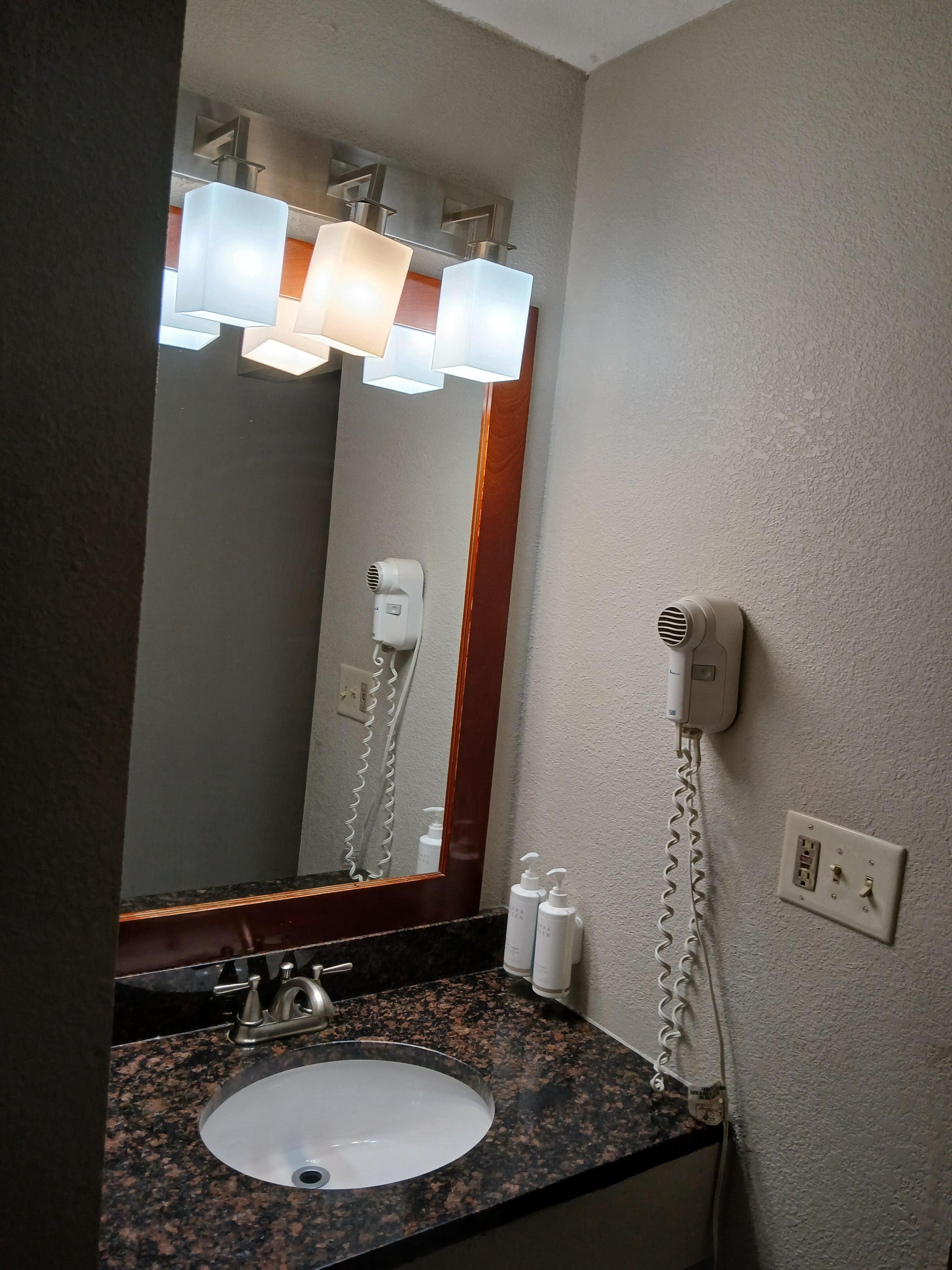 Small area in the bathroom for prepping before going out.