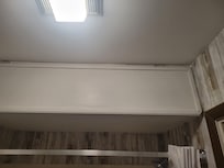 They use a door to cover holes in a wall
