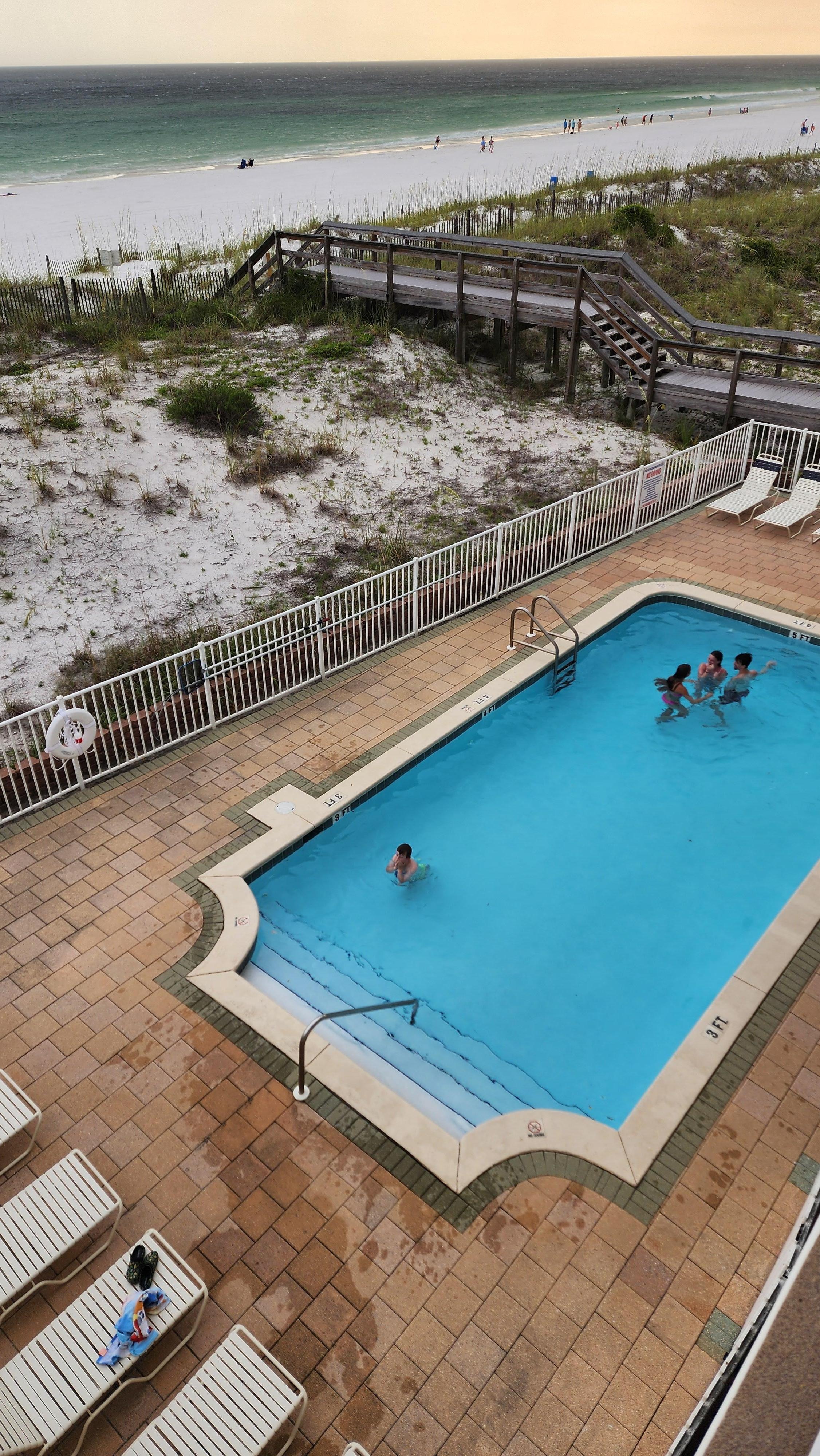 From the balcony; pool was NEVER crowded!