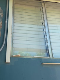 Broken window. One in the kitchen and one in the west bedroom