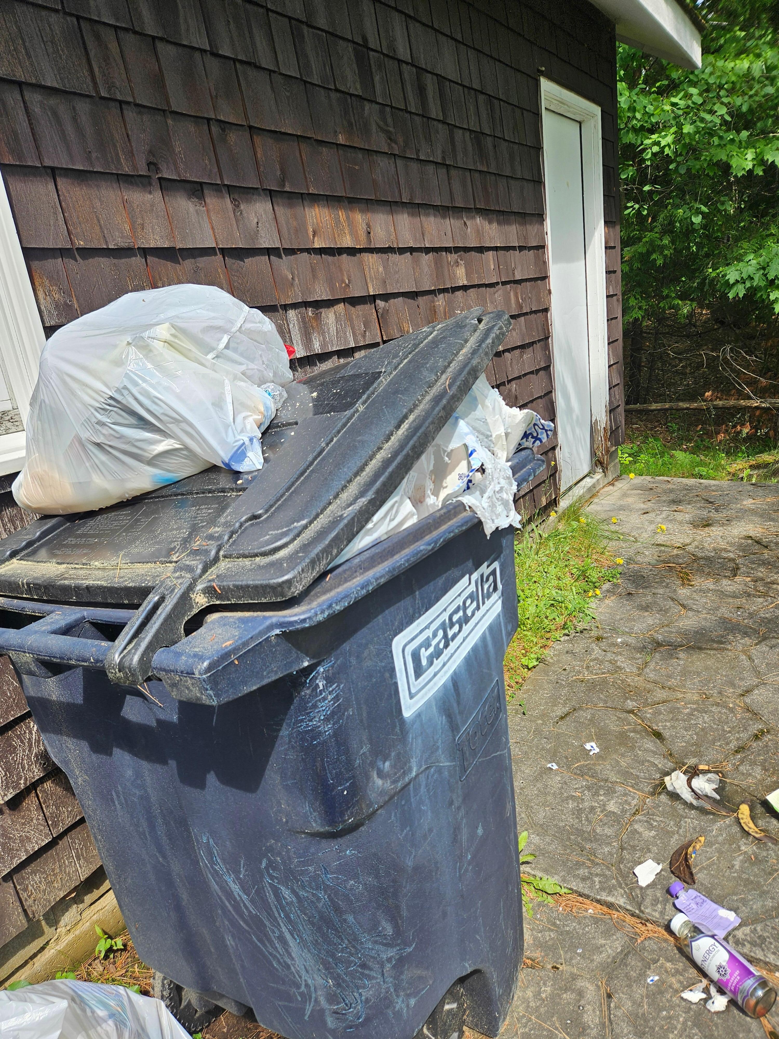 Overflowing Garbage left by previous guests