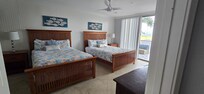 Third floor double queen and twin bedroom with balcony and large bathroom