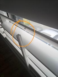 broken window blind piece