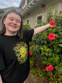 Our youngest love flowers around F1 condo in Waikoloa village