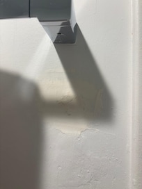 Patched holes in the walls.