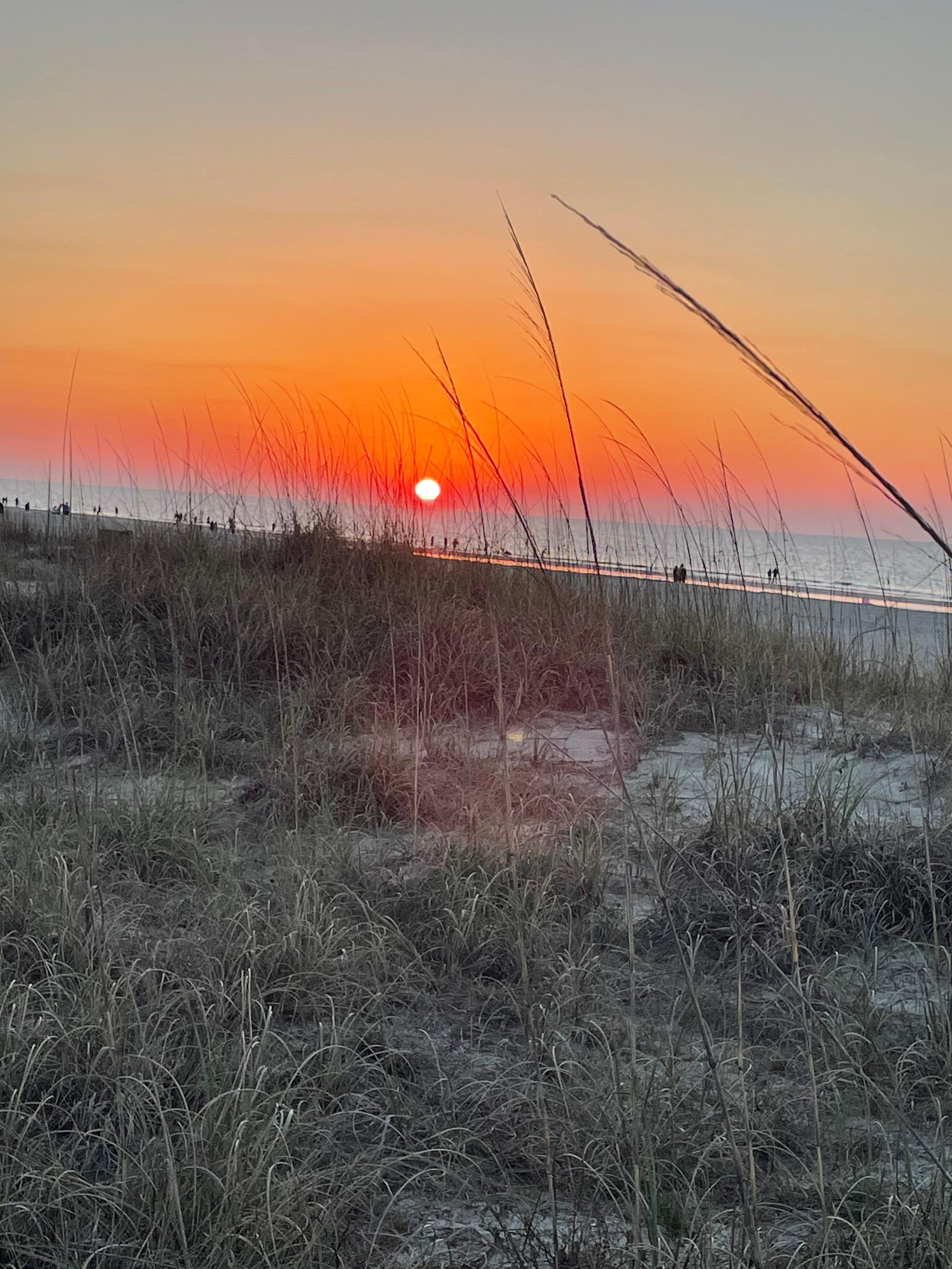 Morning sunrise steps from condo. 