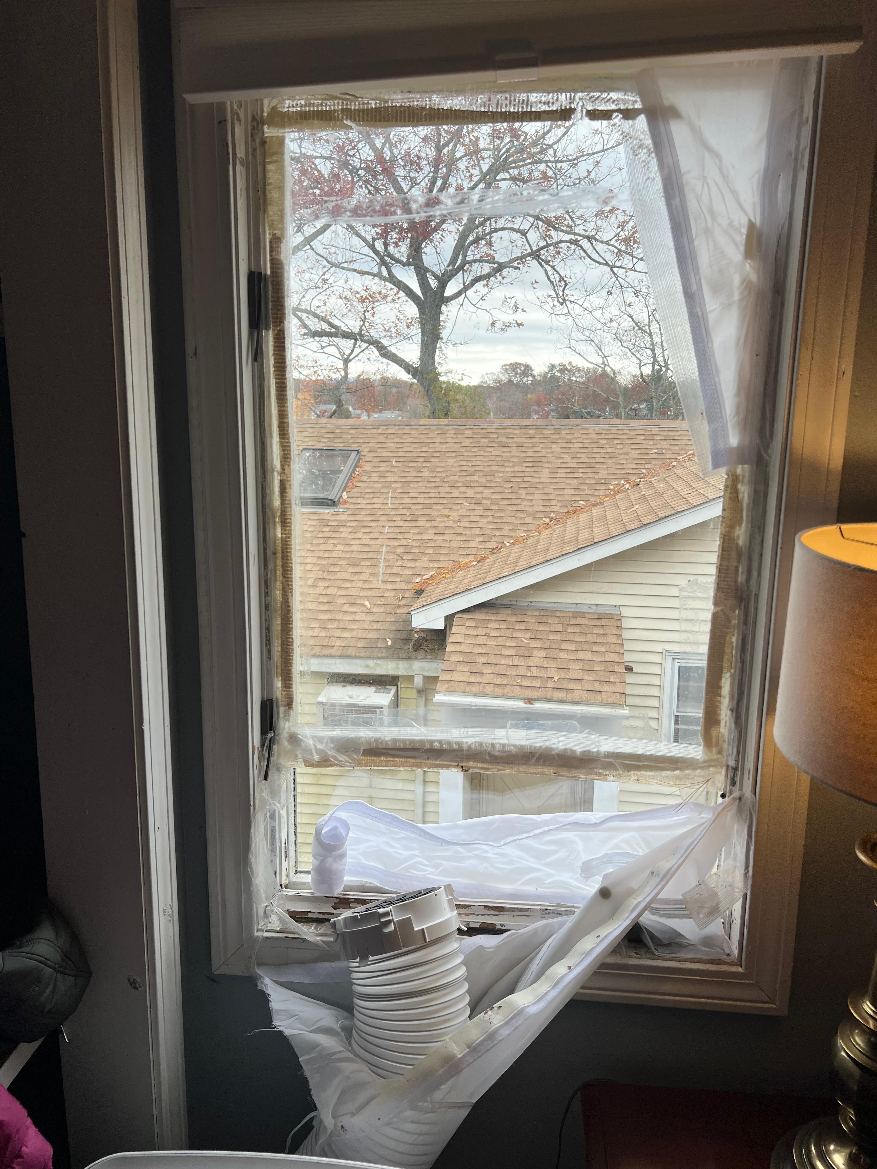 Window in upper bedroom is broken at the top and this nonsense was covered by the window shade.