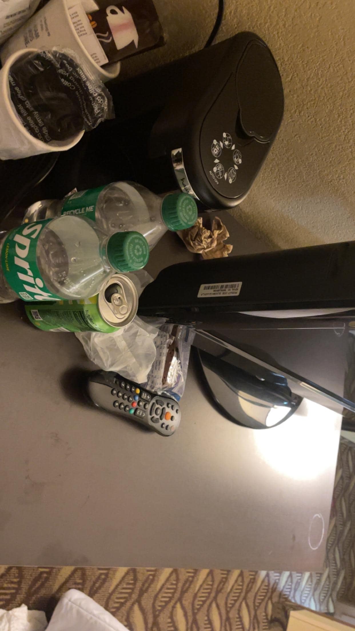 Open garbage left on tv stand