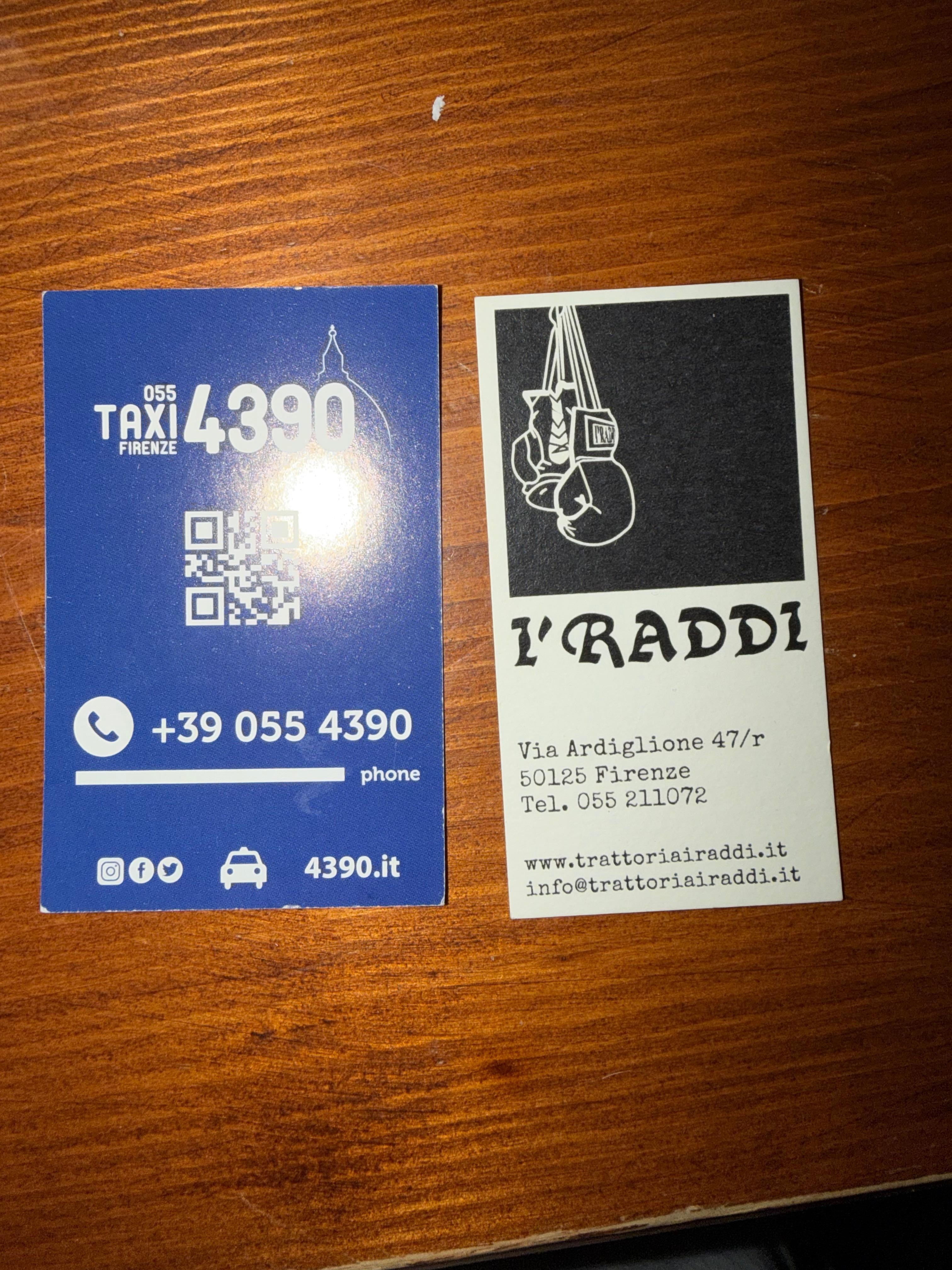 Taxi phone and the restaurant next door