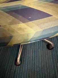 The stains on the rolling chair.