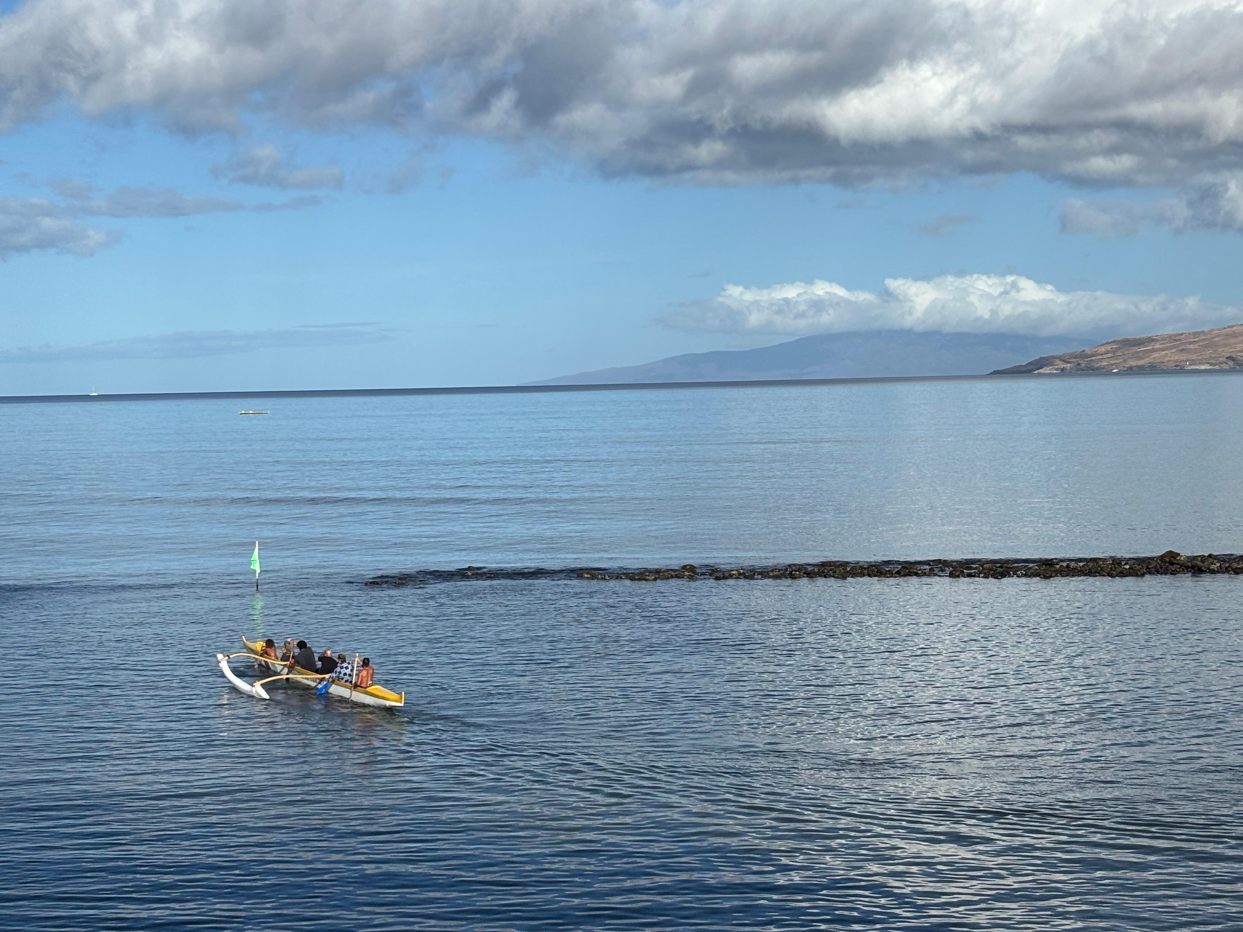 Outriggers paddling every morning before the breeze comes up. 