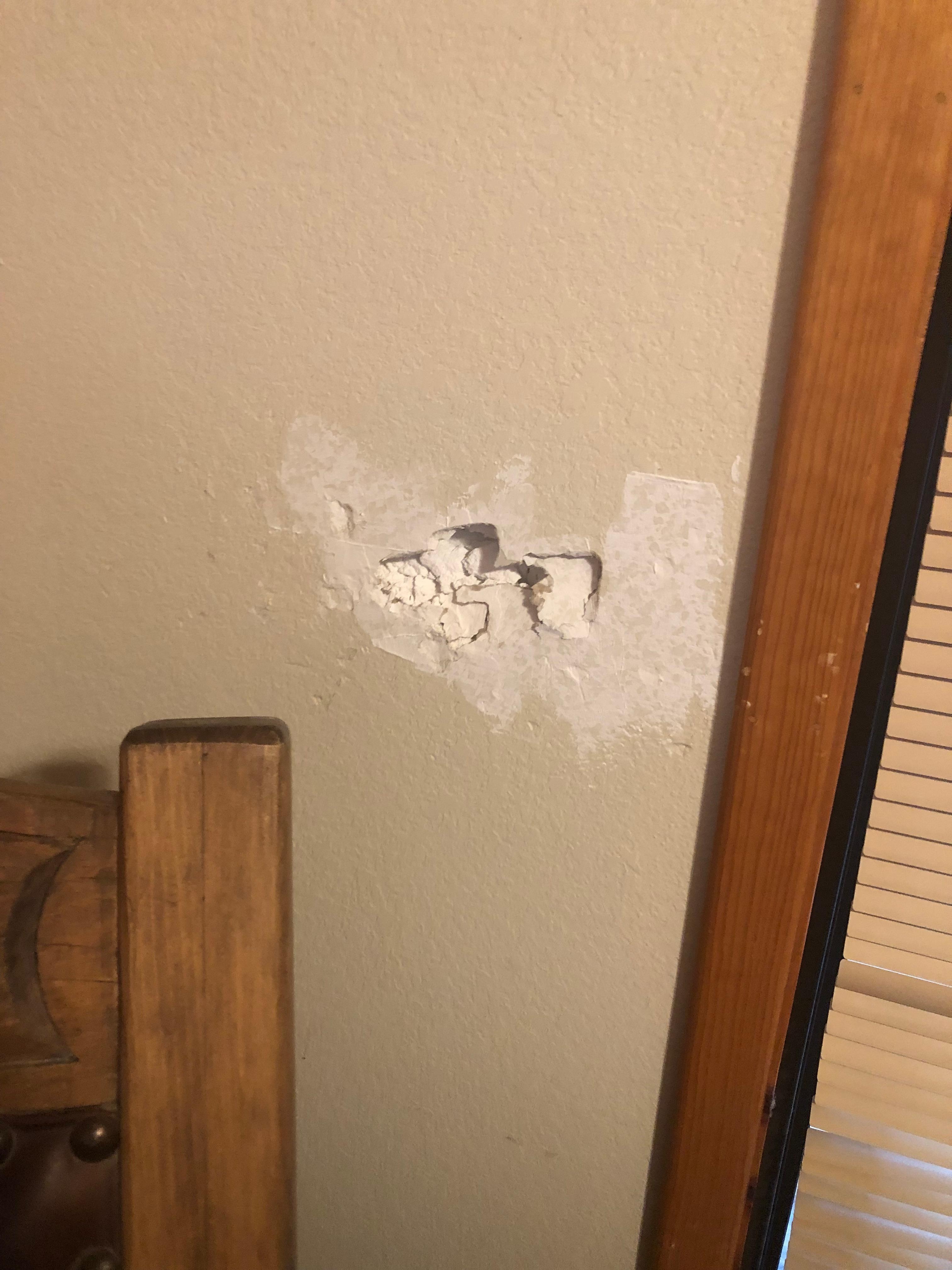 One of the holes in the walls.