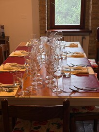 Dining table set and waiting for chef to deliver first course and sommelier to pour the first taste of wine!