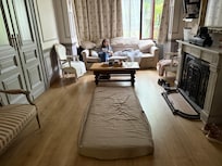 Cushion moved upstairs to sleep on the floor