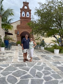 Main entrance to Spanish Mission style hotel lobby and bar.