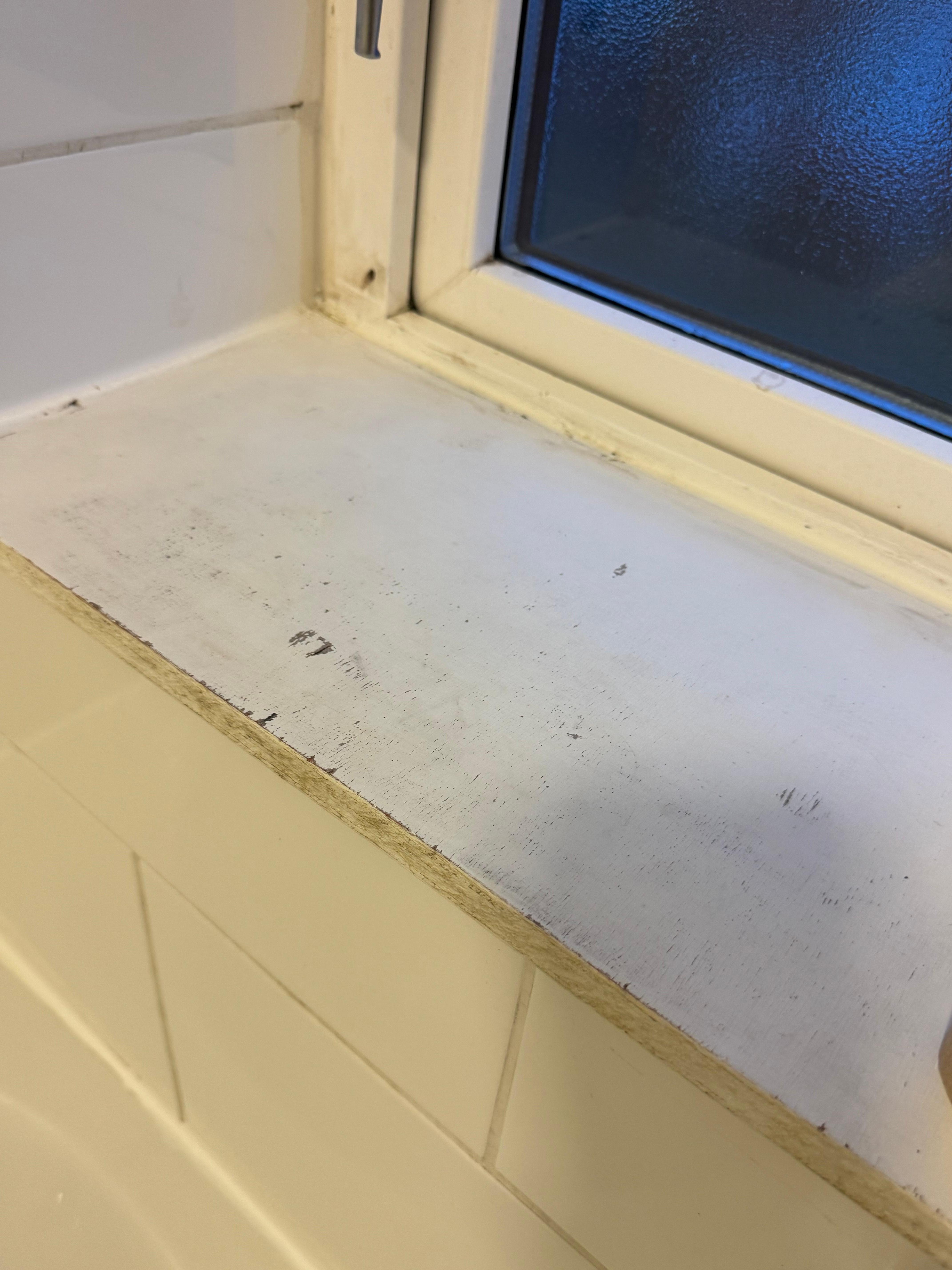 Grubby window sill