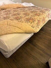 Actual bedding on King bed; too small, lightweight and old.