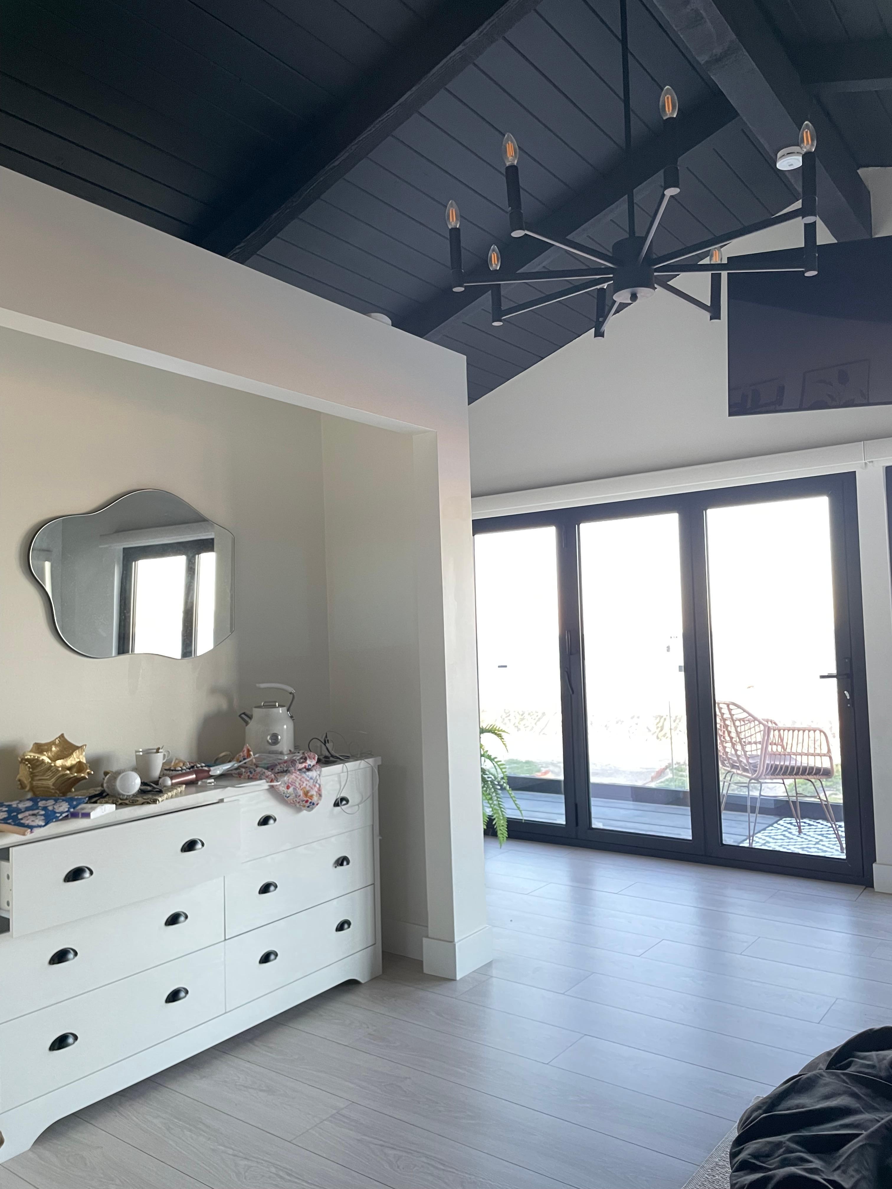 Amenities in main bedroom which include hot water kettle, mini frig, coffee, tea and cookies.