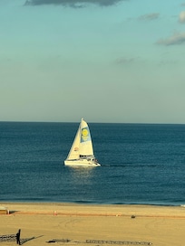 Sailboat on the ocean from the balcony.