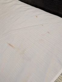 Blood stain on pillow
