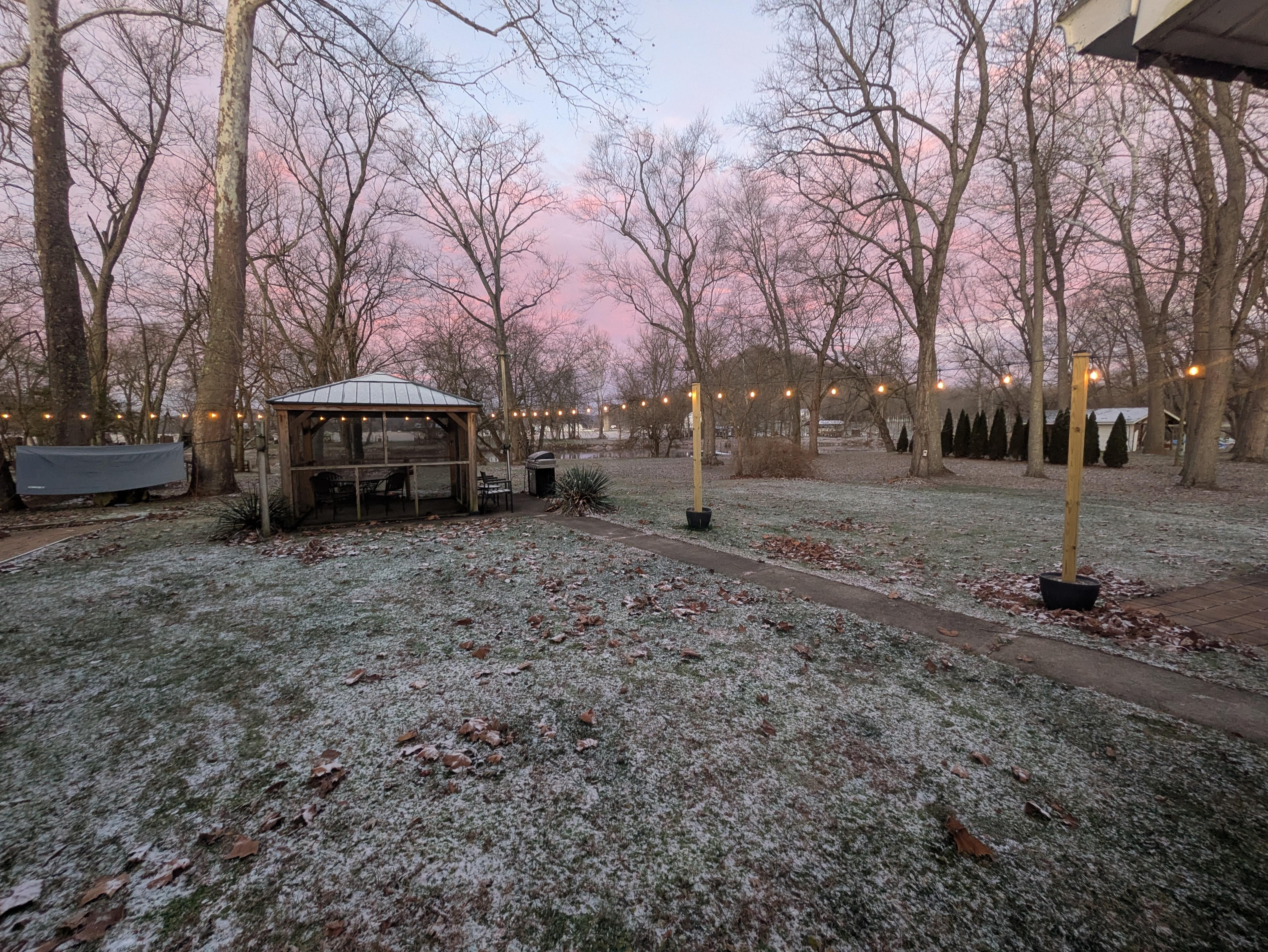 Sunrise looking out the back towards the enclosed sitting area. 