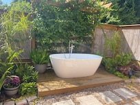 Best tub experience at night. Beautifully lit and feels great to be outside the plants are inviting.